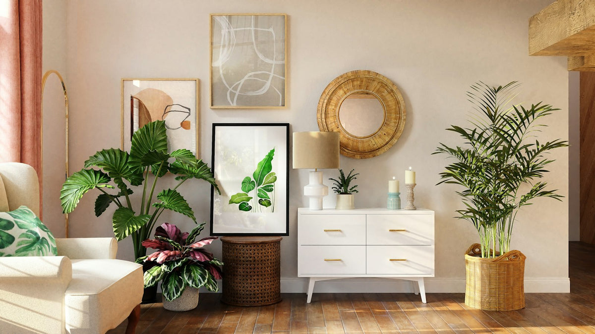 Styled shelf with plants, framed art and a round mirror