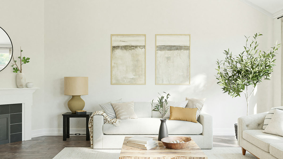 Bright neutral living room with an olive tree